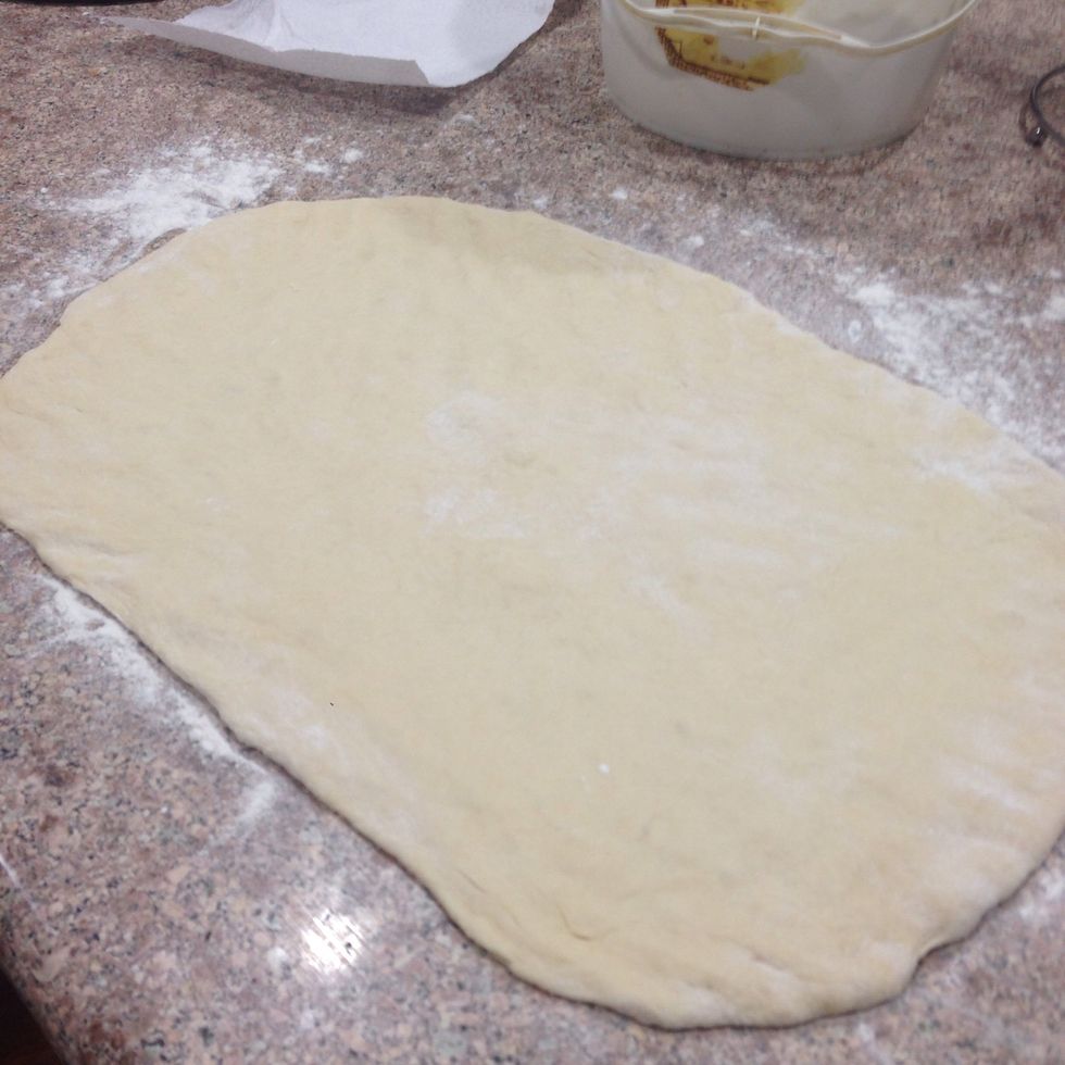 Shape into a rectangle. Roll out app. 10x12-inch inch rectangle, and about 1/2-inch thick.