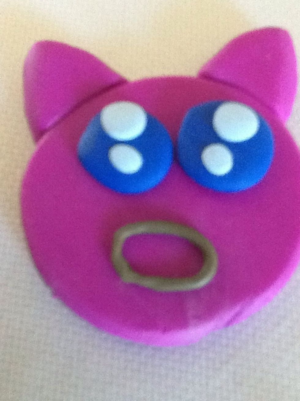 Shape it to an oval and attach it to the face