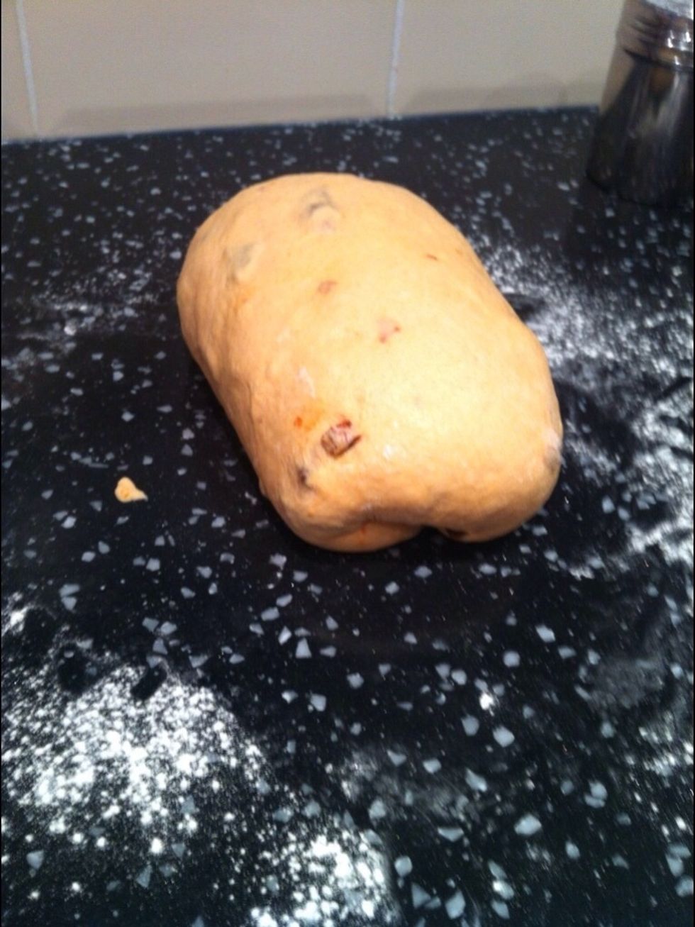 Shape the dough into a rectangle and fold the edges underneath. The seam should be at the bottom.