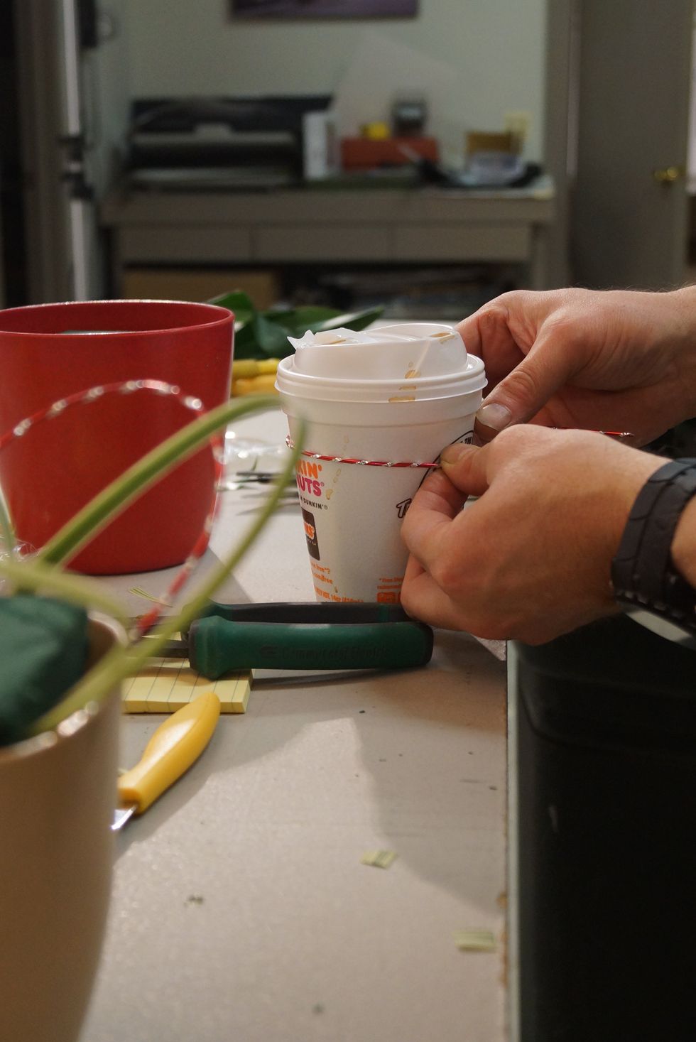 Shape your Diamond Wire by wrapping it around a cup or vase