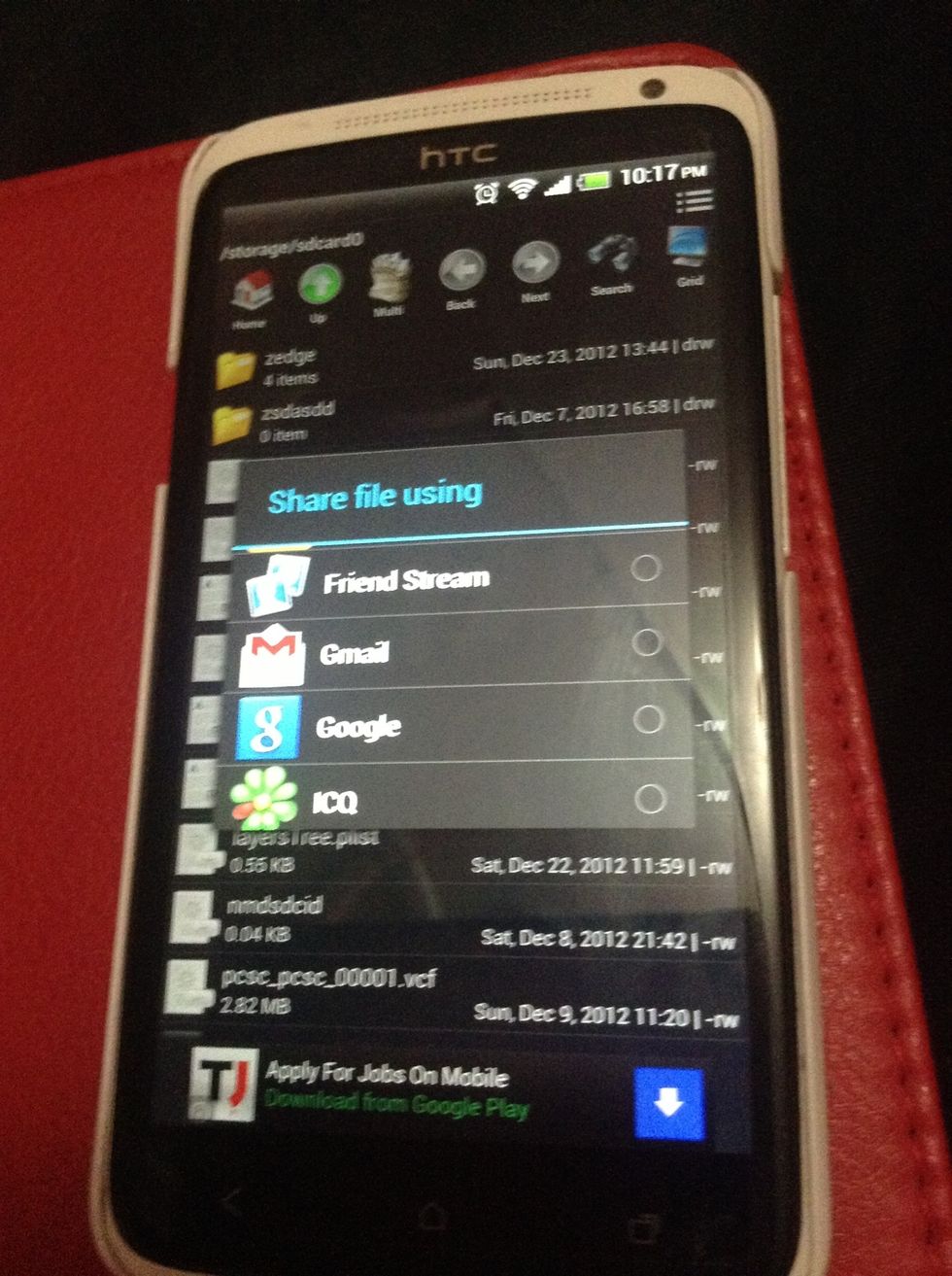 Share the file via gmail...mail yourself the .vcf file..