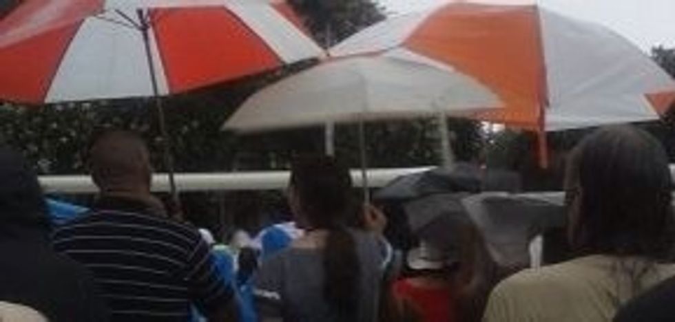 Share your umbrella with a stranger in the rain. It's OK if you get a little wet.