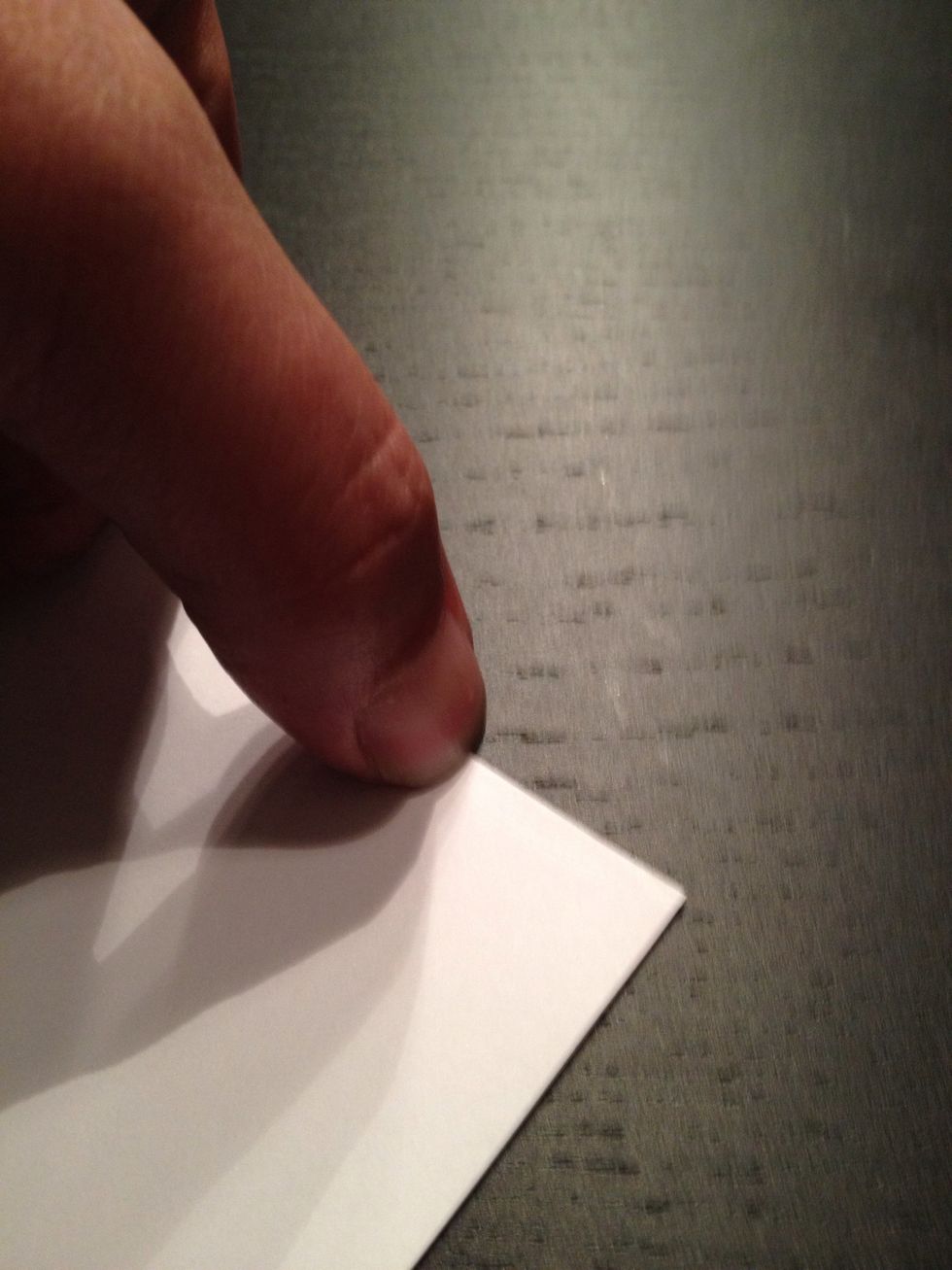 Sharpen the fold a couple of times with your nail