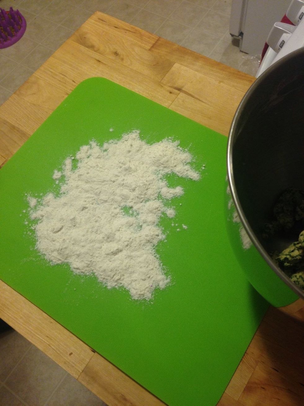 Shift out a bit of flour for kneading.