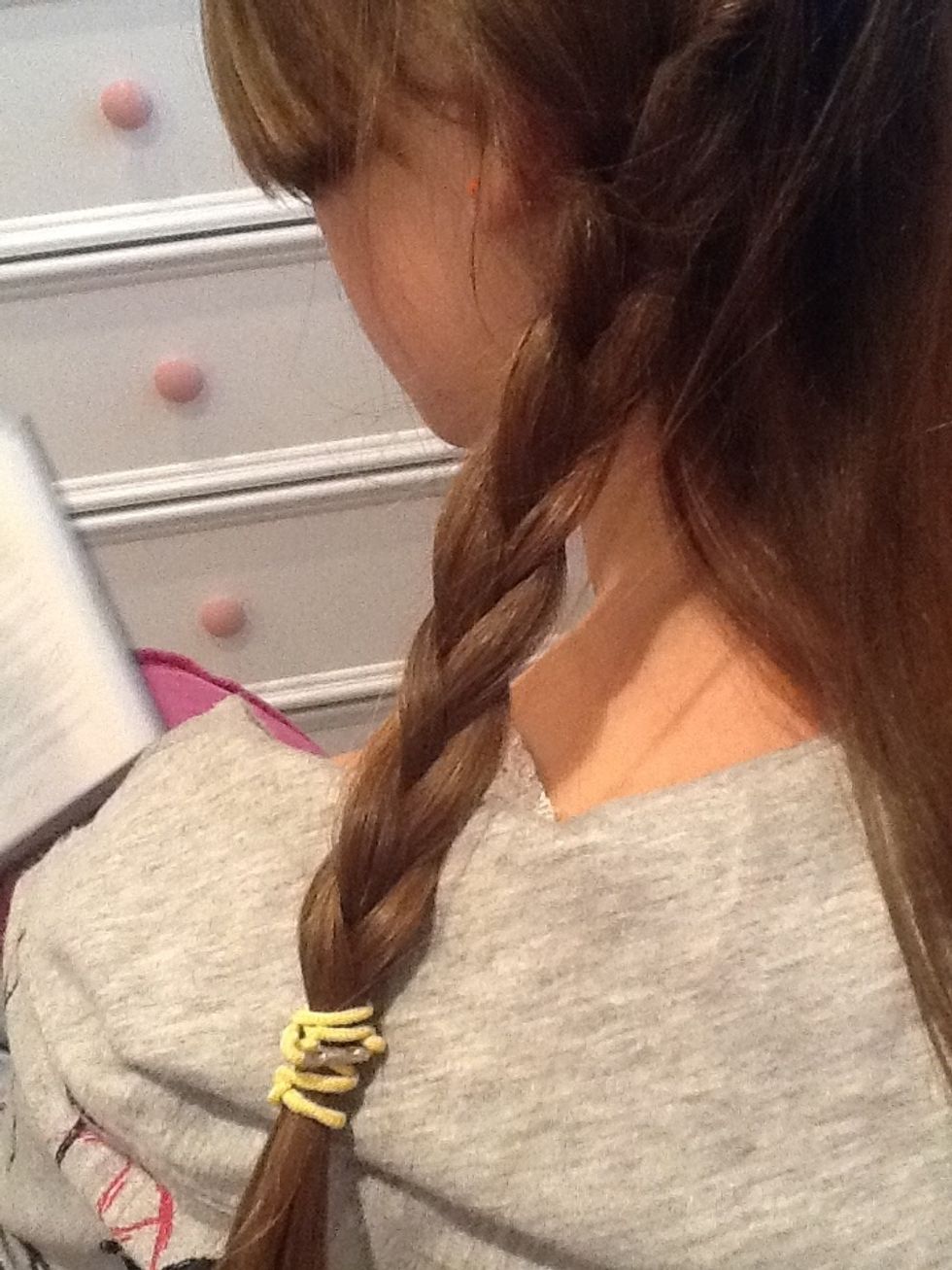 should end up like this. braid remaining two parts.