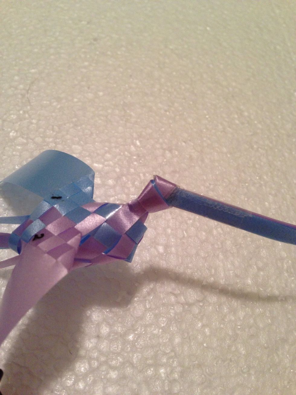 Should look like this.  Scotch tape strips together after knot.