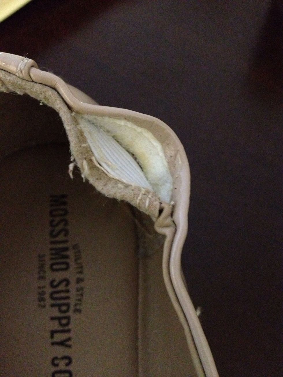 Should look like this- you should be able to see the elastic. Mine had adhesive on it, so just gently pull apart the layers.