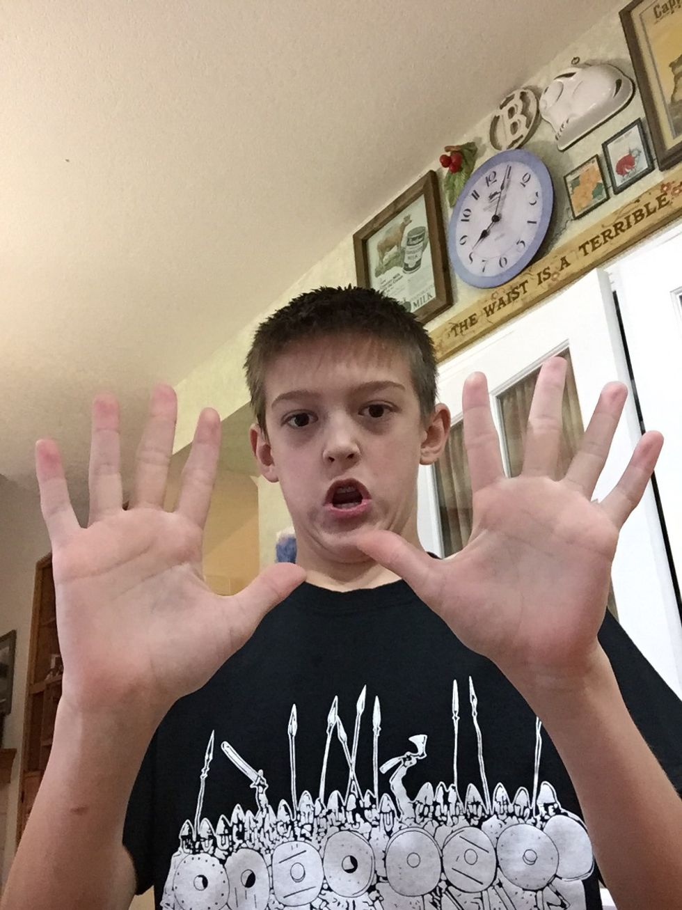Show the audience with both of your hands and act like it "disappeared."