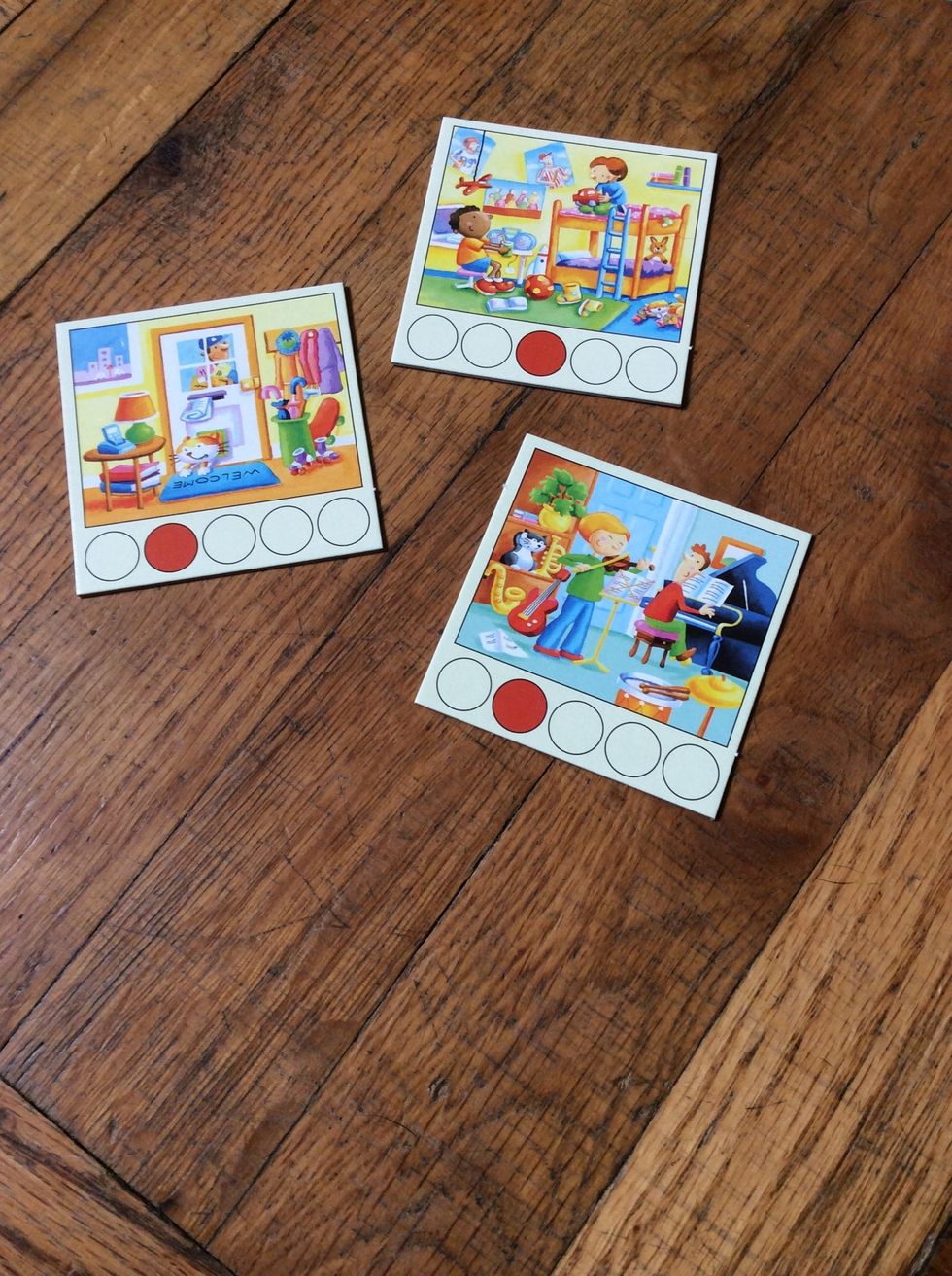 Show three Room Cards and ask the learner to name items they see.