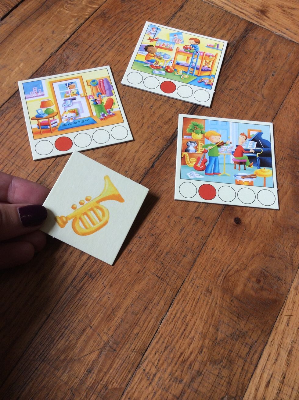 Show three Room Cards, then hold up a corresponding Object Card and ask the learner to find it. (Be sure to select an object that is pictured and one of the rooms.)