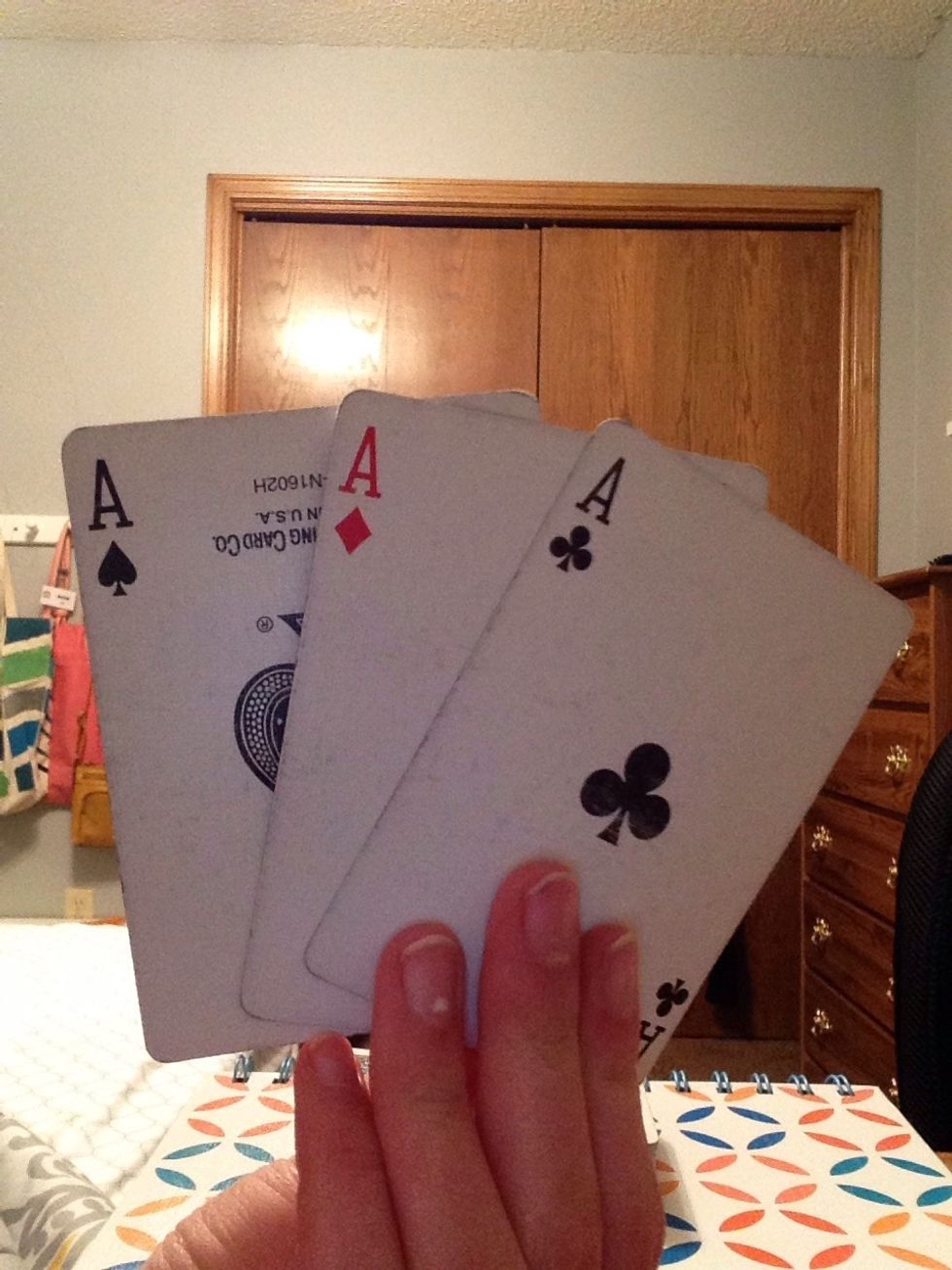 Show your friend the three aces you kept out of the deck.