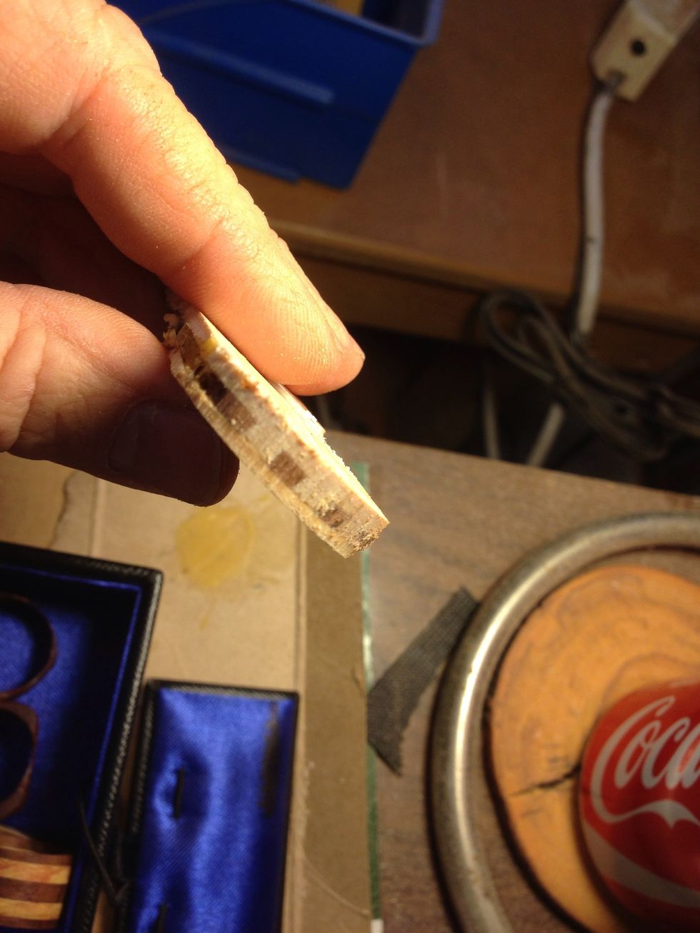 Showing the cross section of the laminated wood. I laid down alternating little beams of wood and sandwiched between two full size pieces.