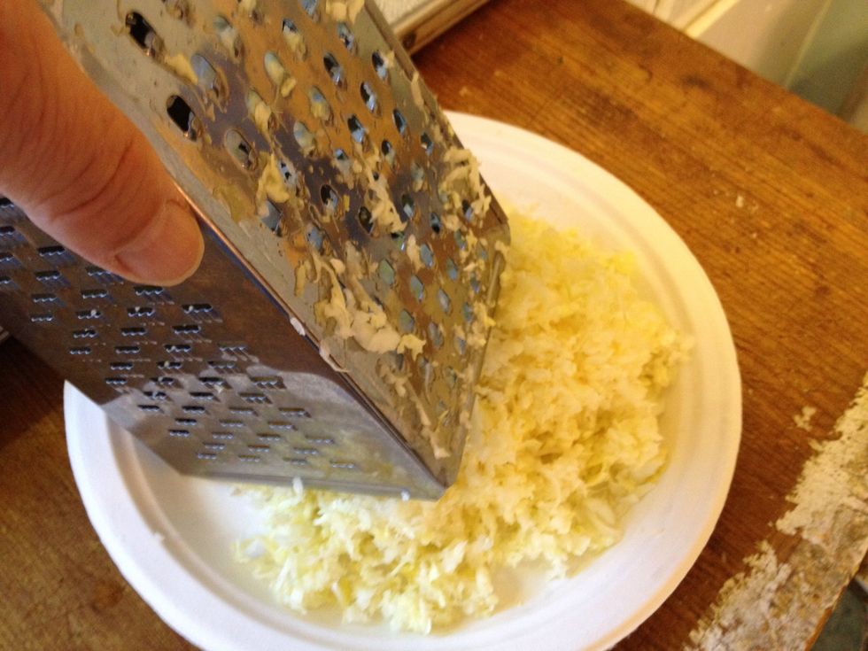 Shred cabbage. About one cup for every two potatoes. If you're using kale, chop it up small. Add to the frying onions and fry until the onion is translucent and the cabbage or kale is cooked.