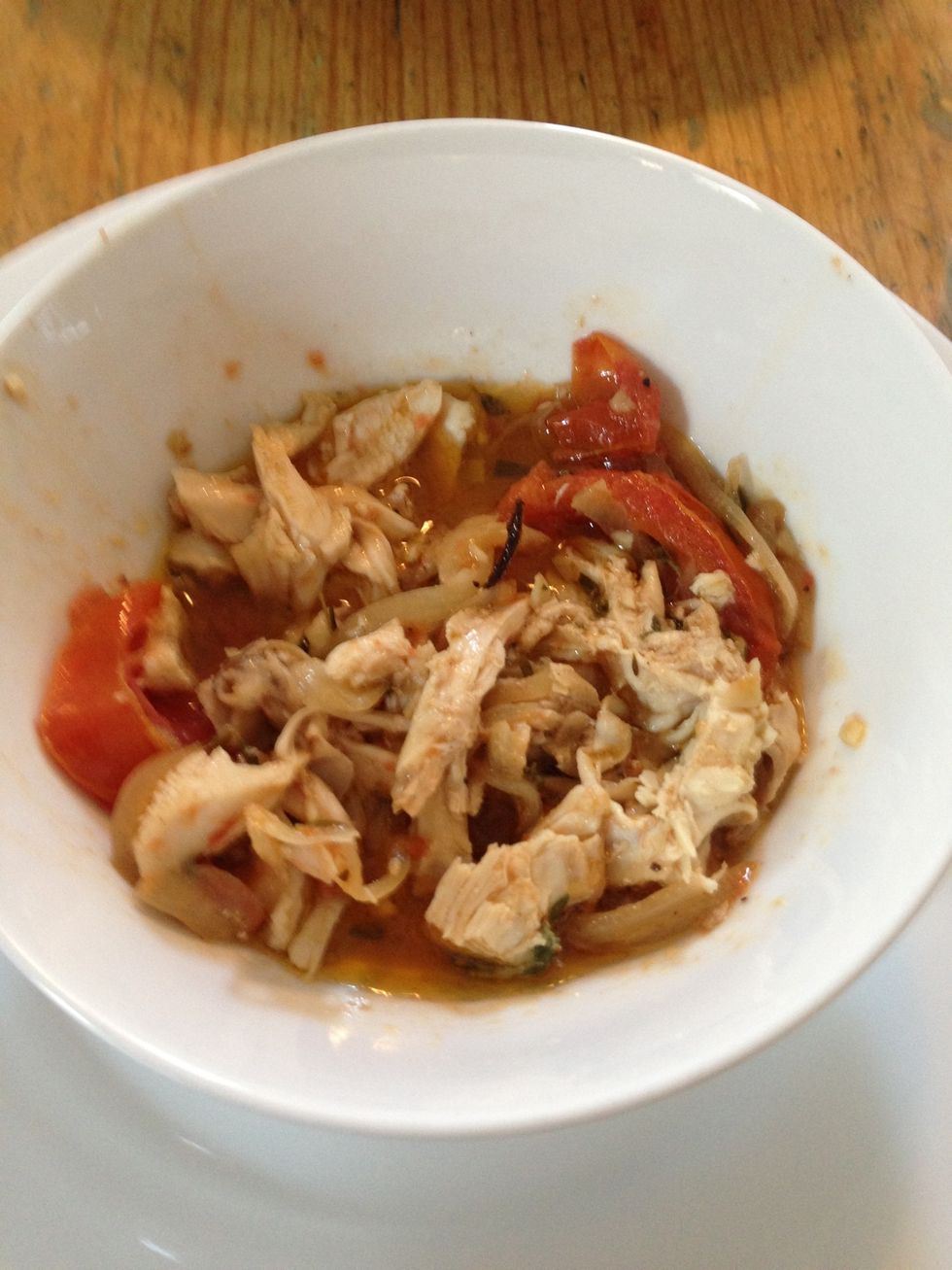 Shred chicken and serve in bowl to capture all the yummy juices and onions and tomatoes