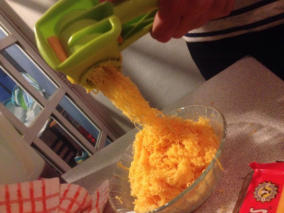 Shred, crumble or do whatever you like to the cheese so it's in smaller pieces.