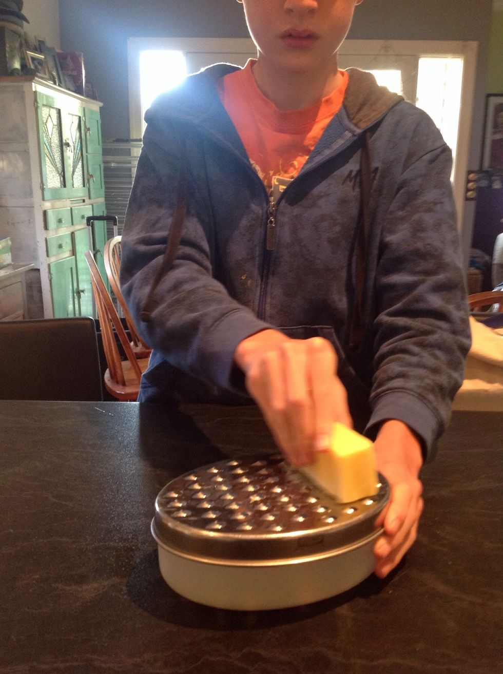 Shred some cheese for sprinkling