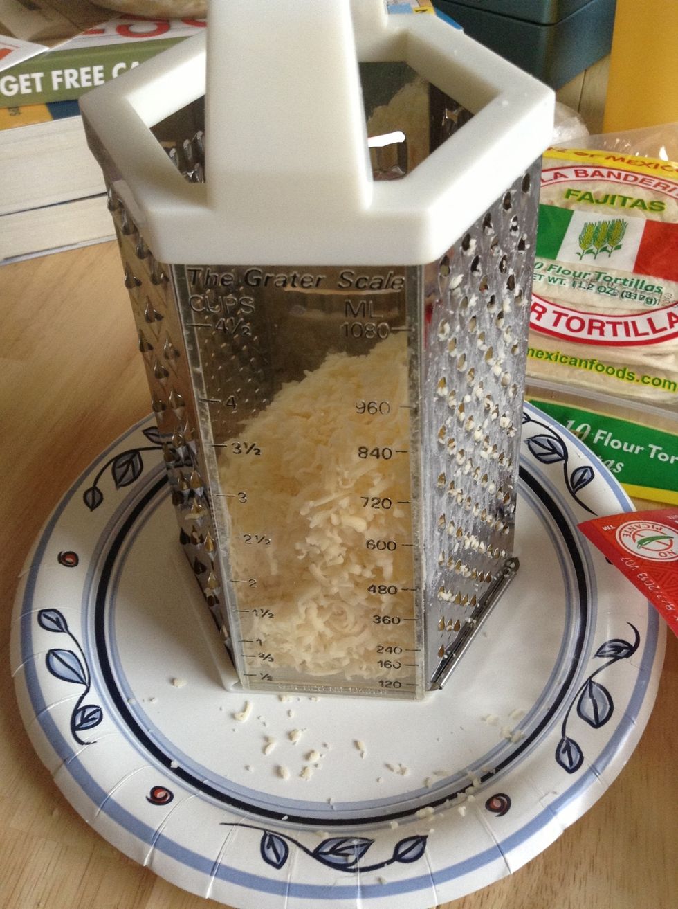Shred some chihuahua cheese. You can buy preshredded but I find it cheaper and much tastier to buy a block and shred it yourself. One block made 3 cups.