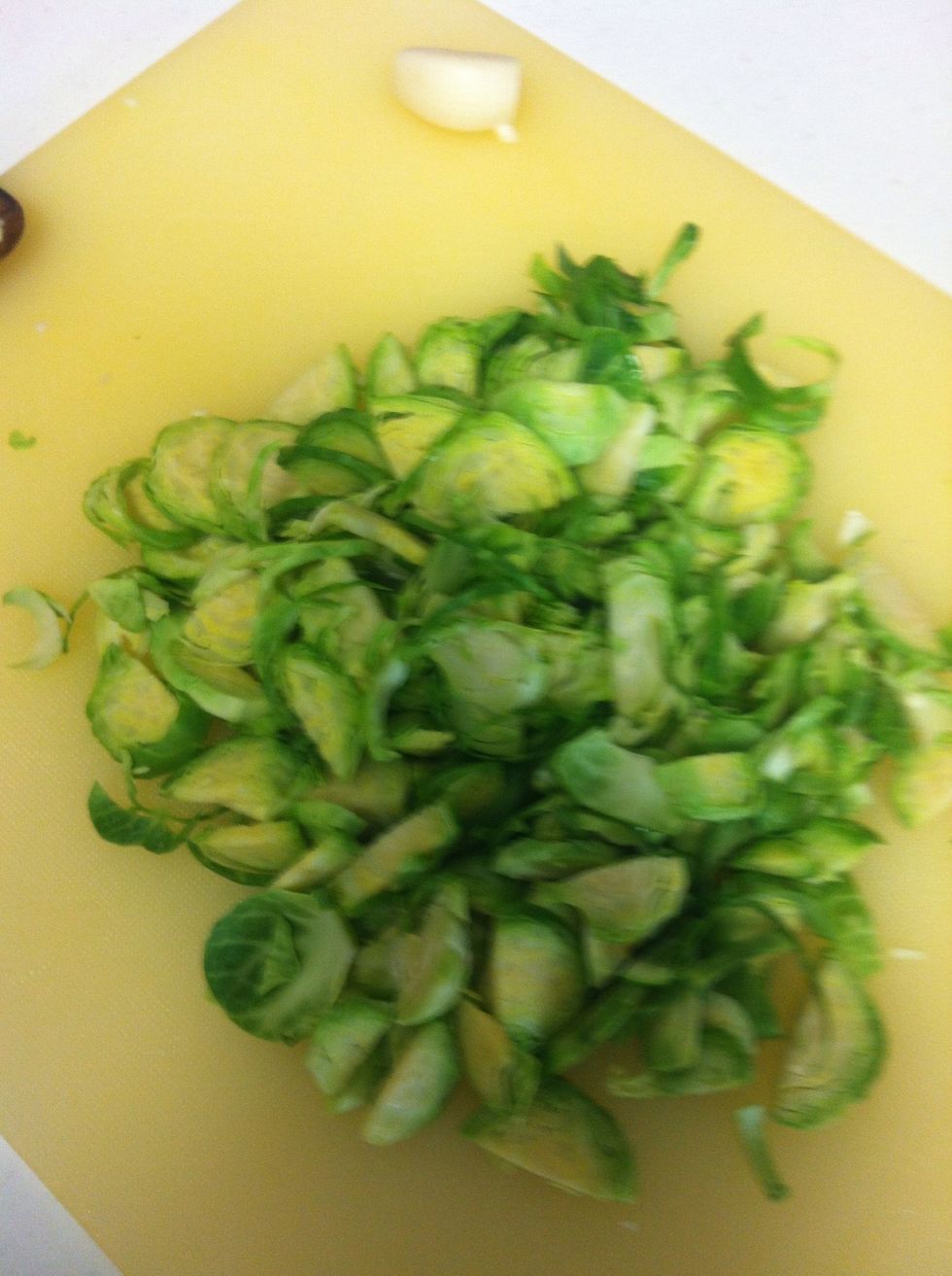 Shred the Brussels sprouts.