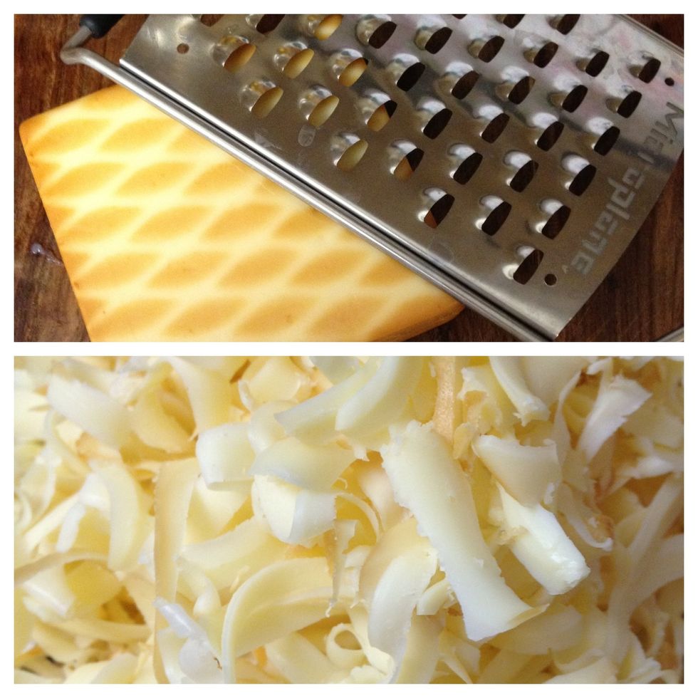 shred "the cheese from the nice side of the store." we use Gruyere cheese instead of bleu cheese, it's our preference, you can use which ever you like =)