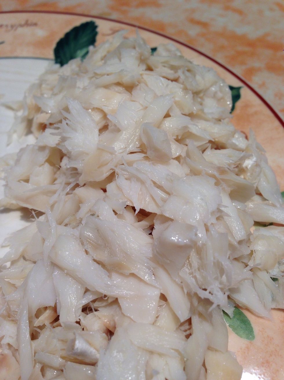 Shred the codfish into small pieces