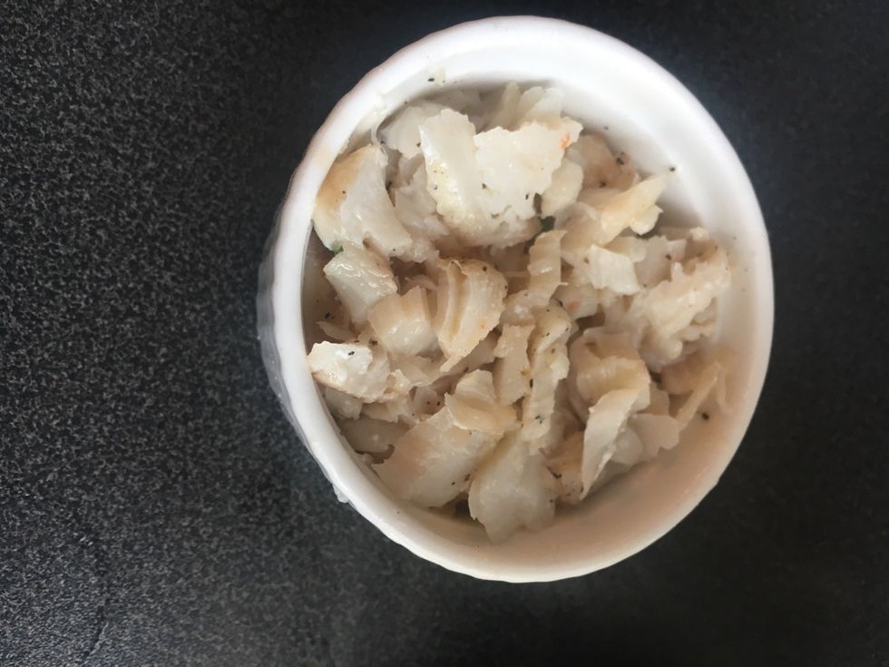 'Shred' the fish with the fork
