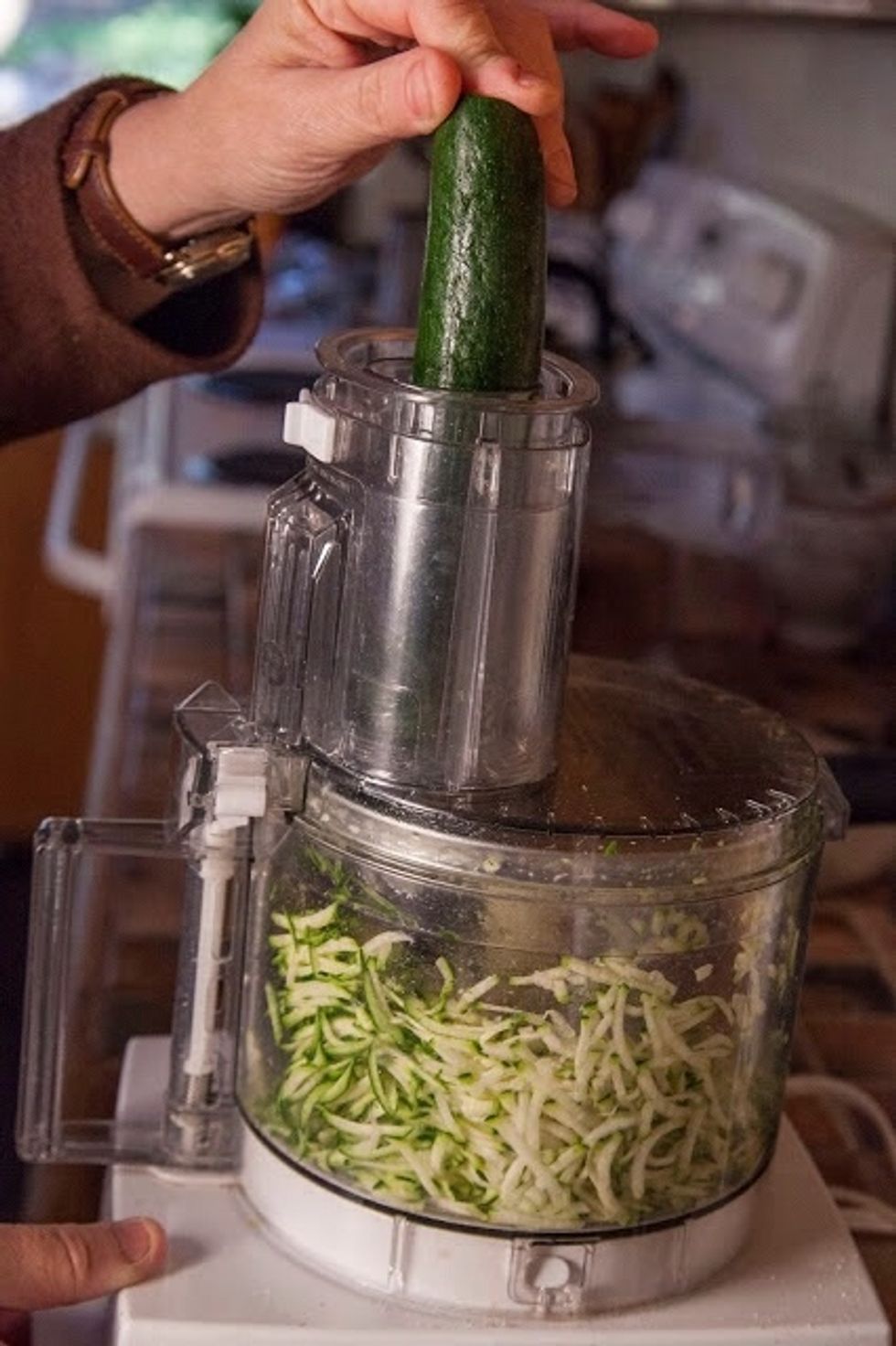 Shred the zucchini.