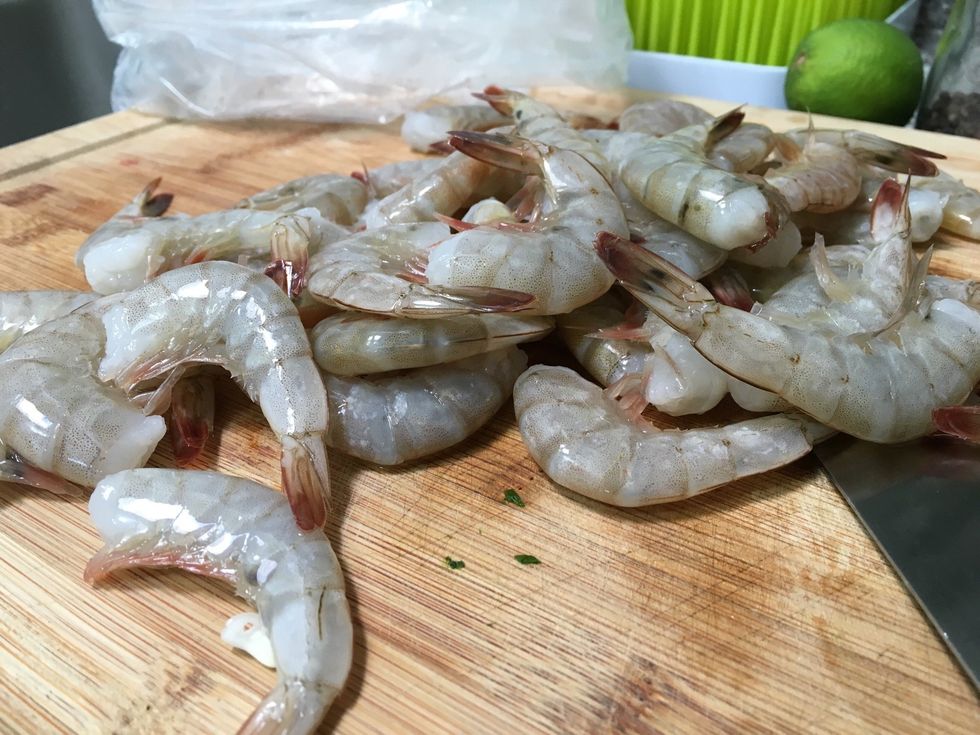 Shrimp prep: Peel and devein the shrimp.
