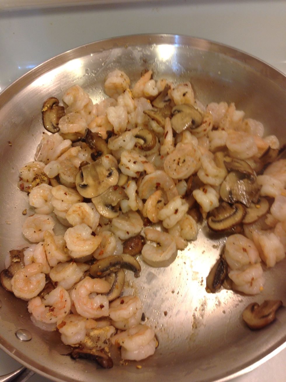 Shrimps done, remove from heat and set aside