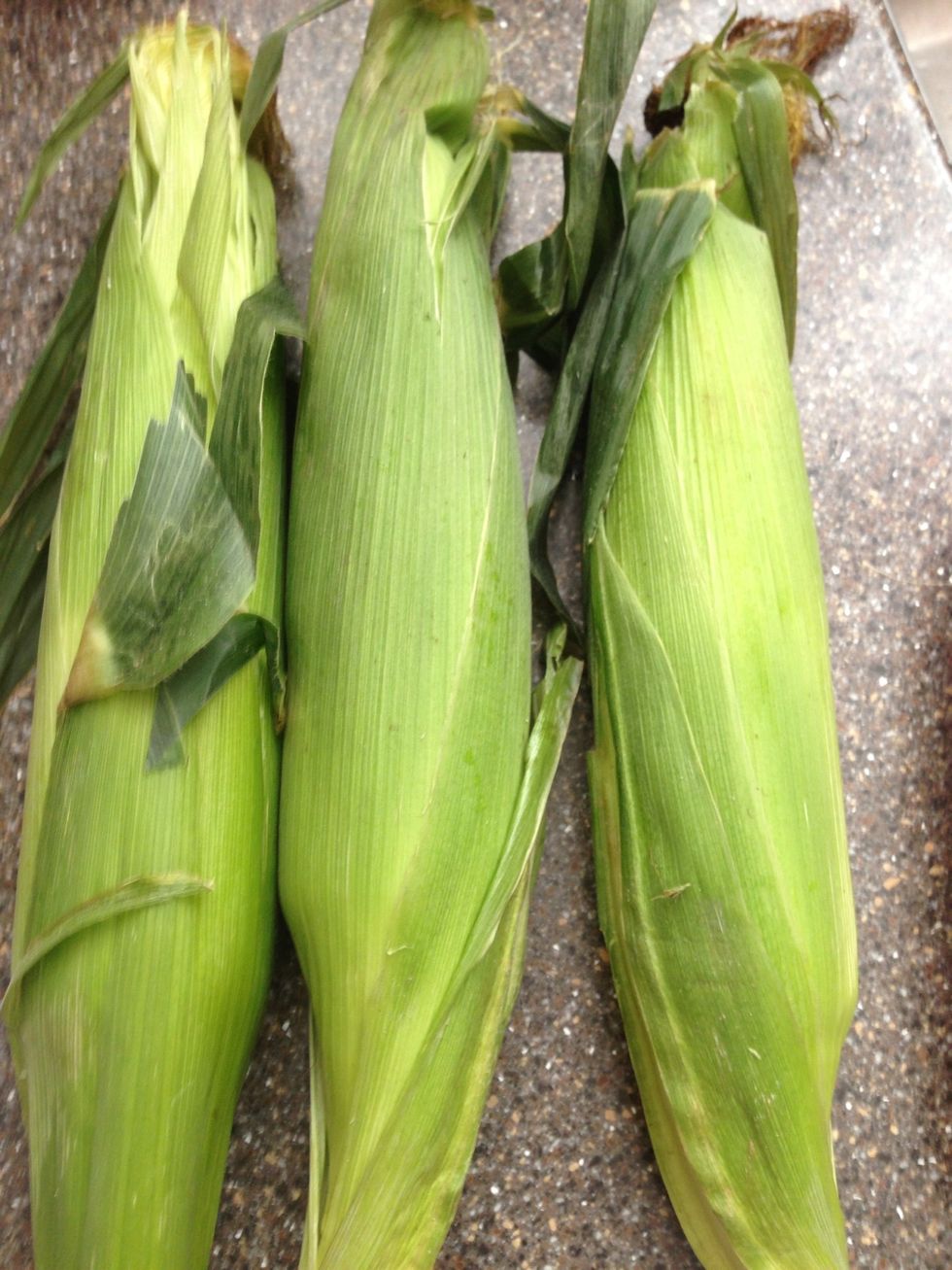 Shuck the corn then wrap each ear individually in foil. * Normally, when I grill foil-wrapped corn in the coals I put butter or olive oil, but not in this recipe - it still turned out great.