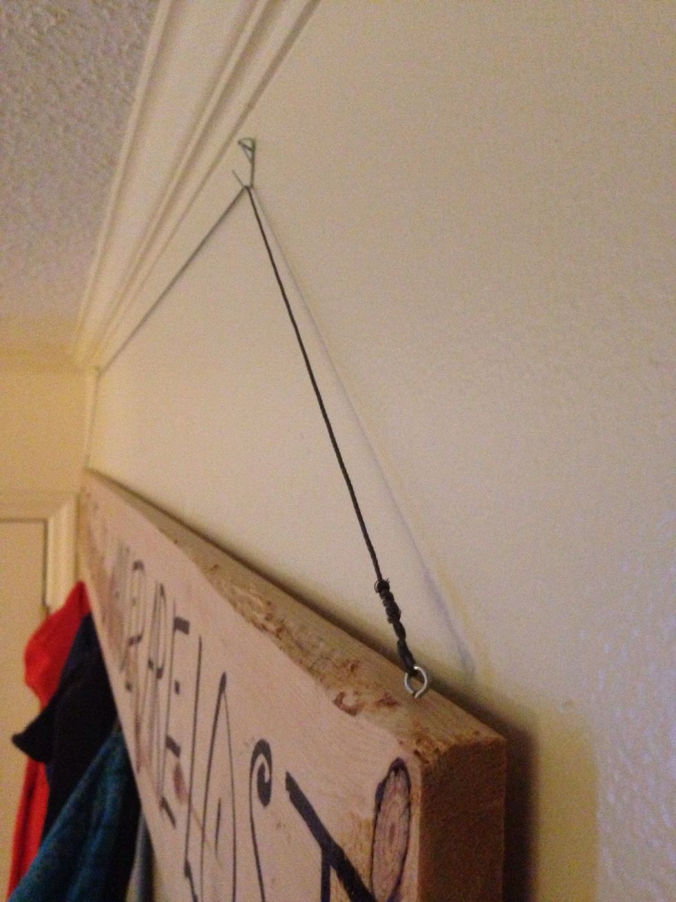 Side view of rack attached to wall.