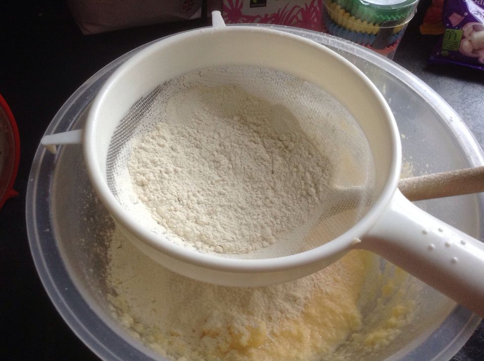 Sieve 4oz of self raising flour