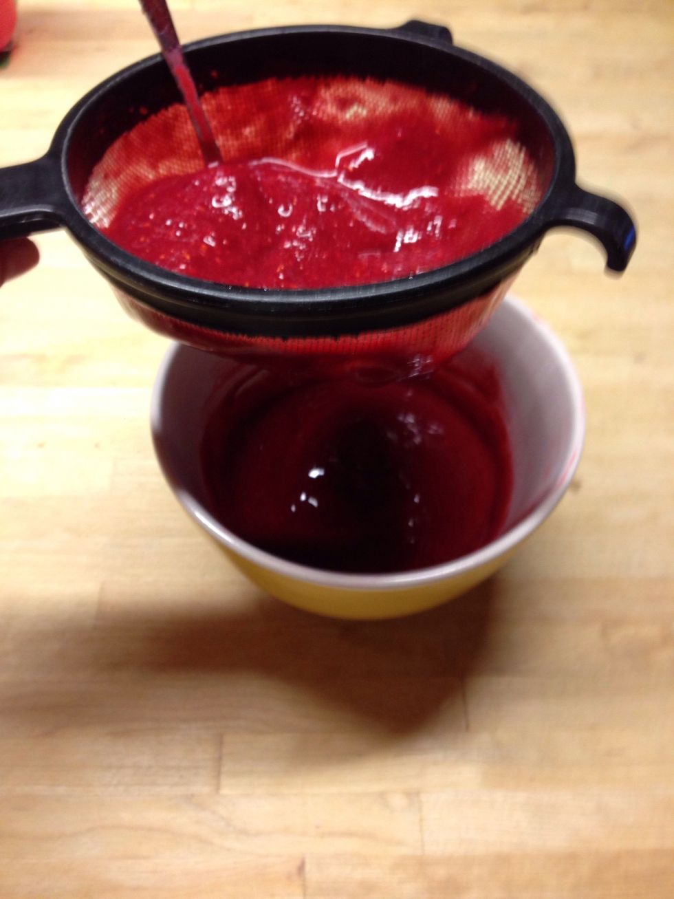 Sieve the raspberries