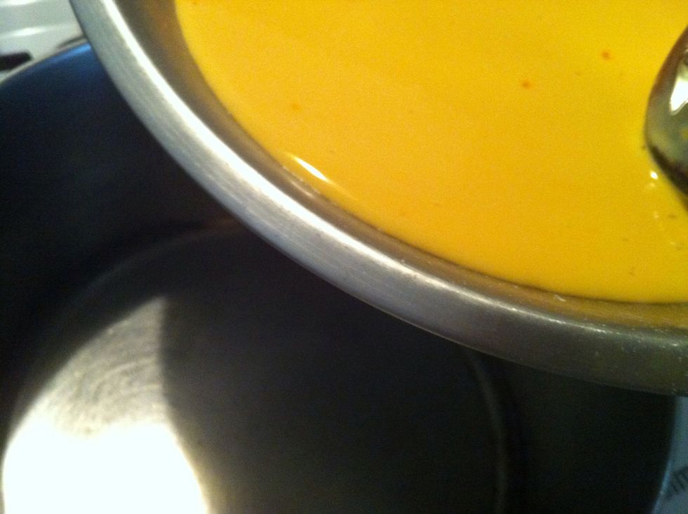 Sieve this mixture to ensure no lumps. Pour it in a steady stream into the pot of boiling water and continue to mix. Leave the flame at medium.