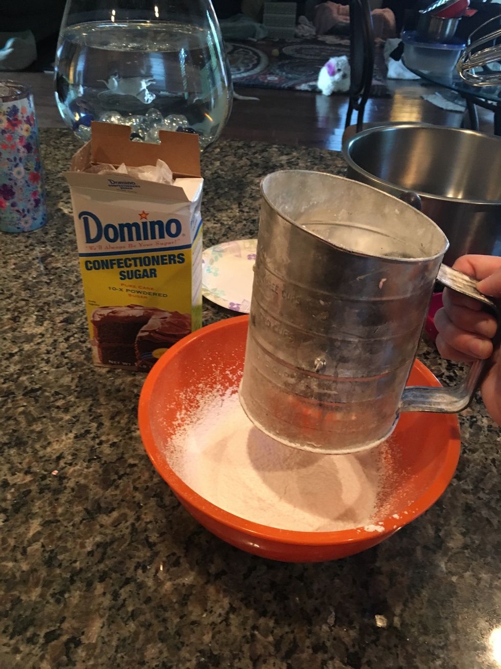 Sift 16 ounces of powder sugar to so they there are no clumps in the powder sugar. This step is important so that the icing will be smooth.