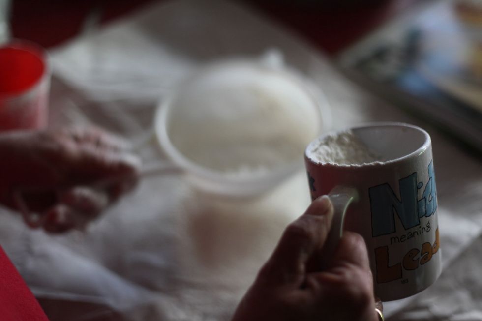Sift 2 cups of flour onto a piece of deli paper.