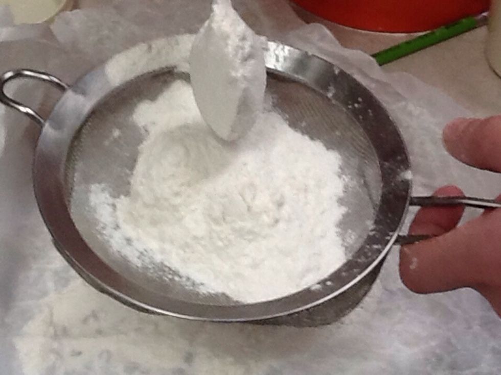 Sift 375mL of flour in large bowl