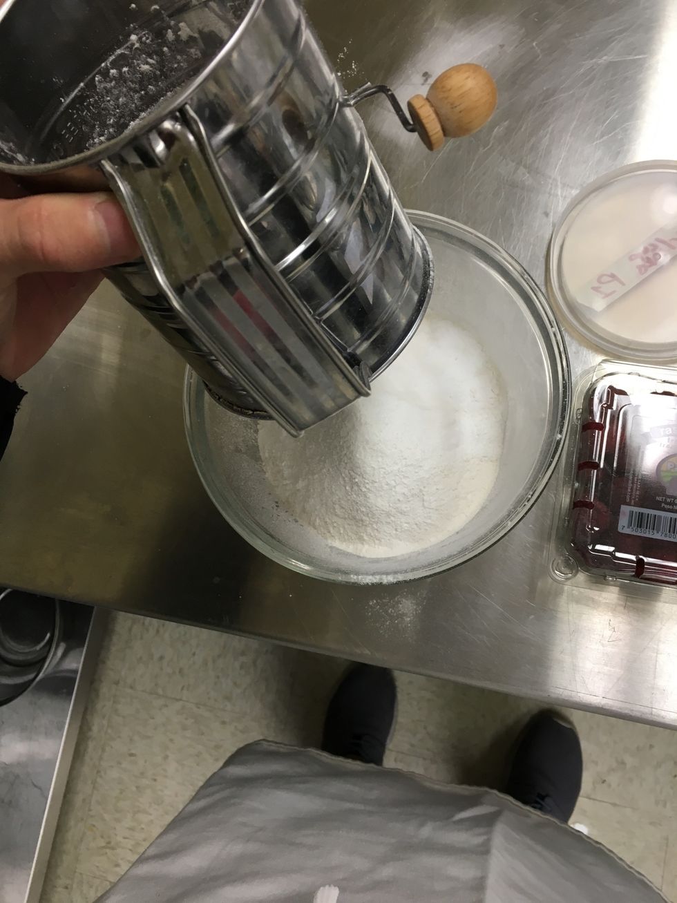 Sift all dry ingredients for the cupcakes into a bowl.