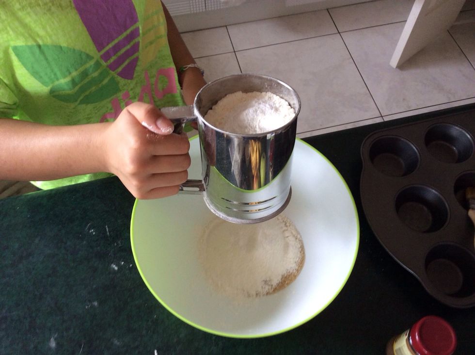 Sift all the flour into a bowl, then combine all the dry ingredients together.