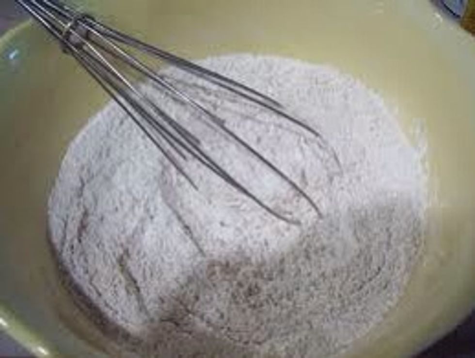 Sift flour and add sugar to mix