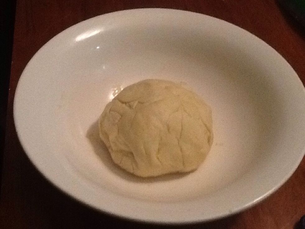 Sift flour into a bowl. Add yeast mixture and oil. Mix to form a soft dough. Turn onto a lightly floured surface. Kneed for 10 minutes