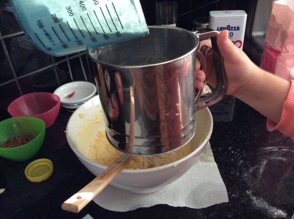 Sift flour into blended mixture