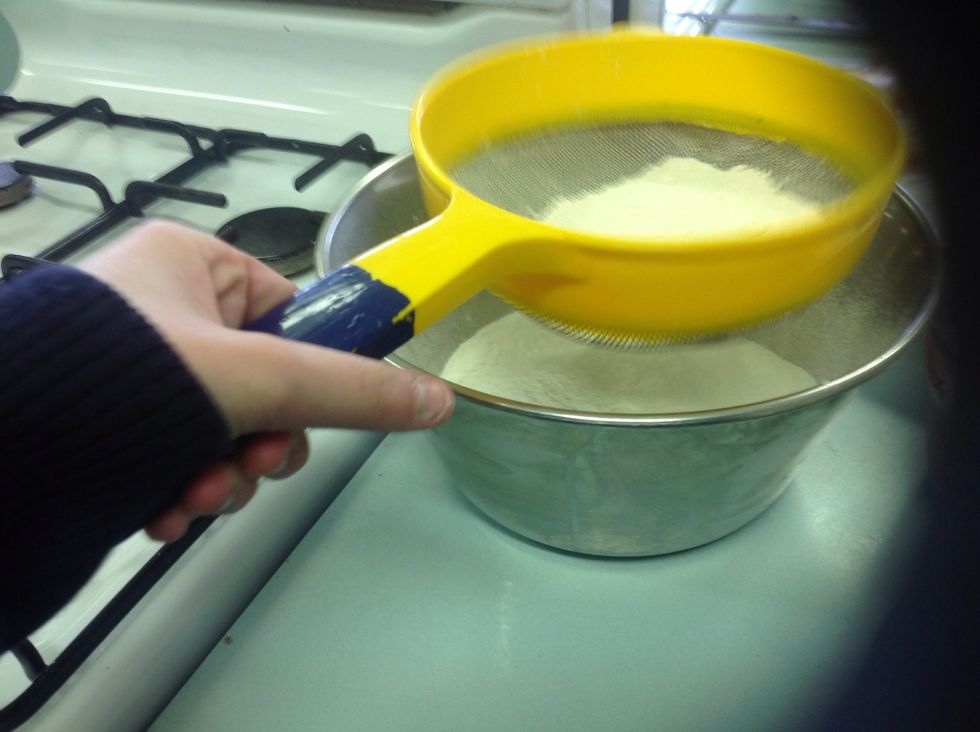 Sift flour into large bowl