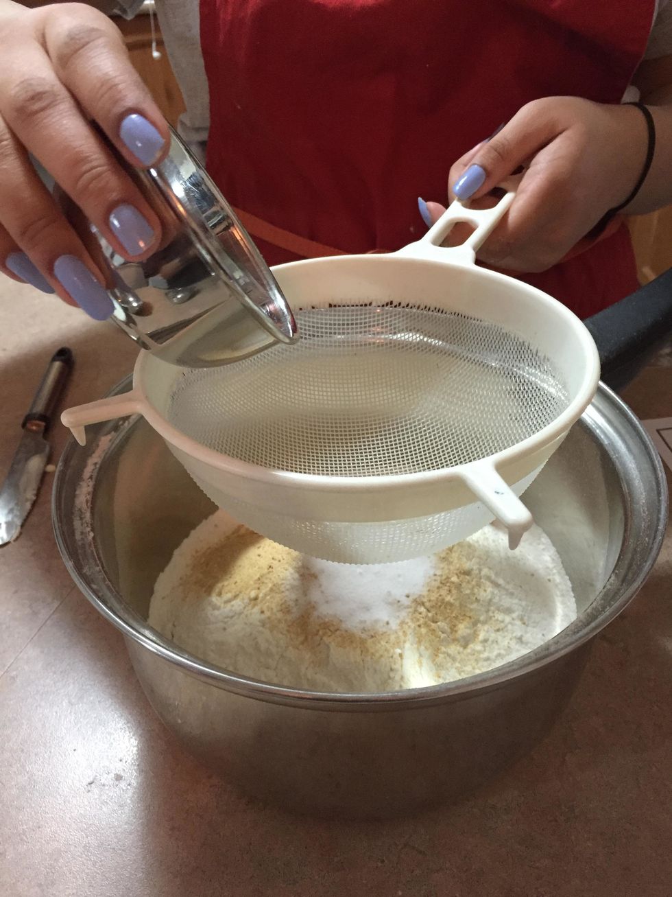 Sift ginger, baking soda, cinnamon, cloves, and salt.