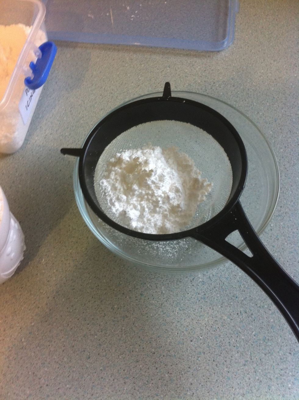 Sift icing sugar into a bowl.