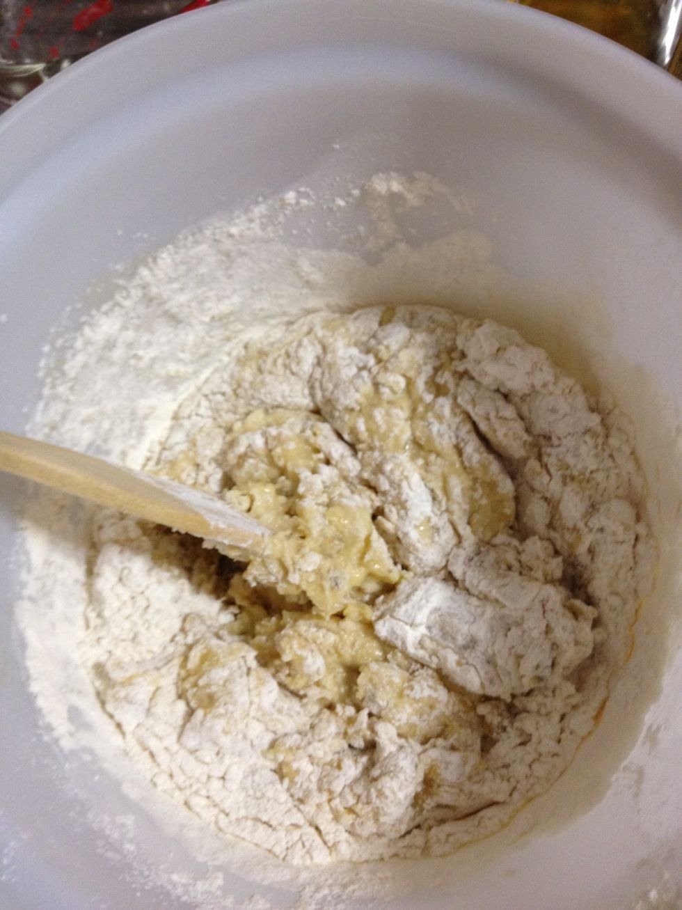 Sift in flour and bicarbonate of soda and mix gently