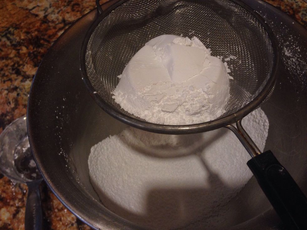 Sift powdered sugar into a large bowl!