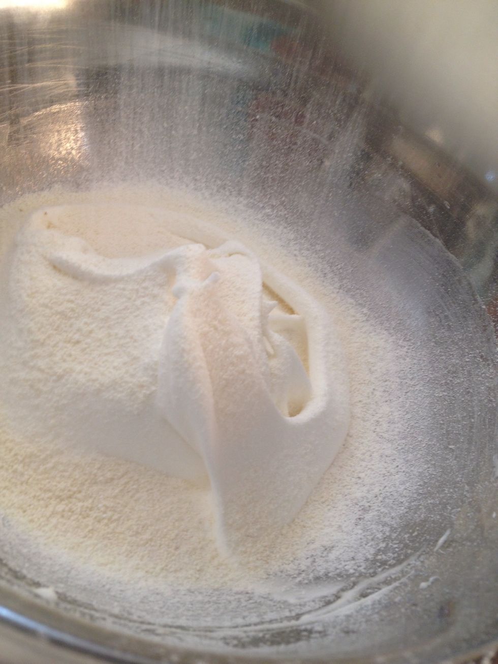 Sift the almond mixture over the egg mixture.