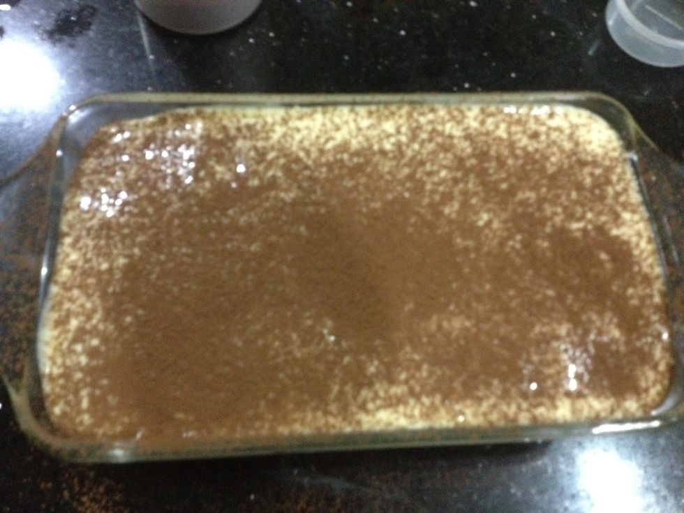 Sift the cocoa powder over the cream. Then refrigerate for at least 2 hours before serving. But I find it still falls apart. Overnight is the best. \ud83d\udc4d