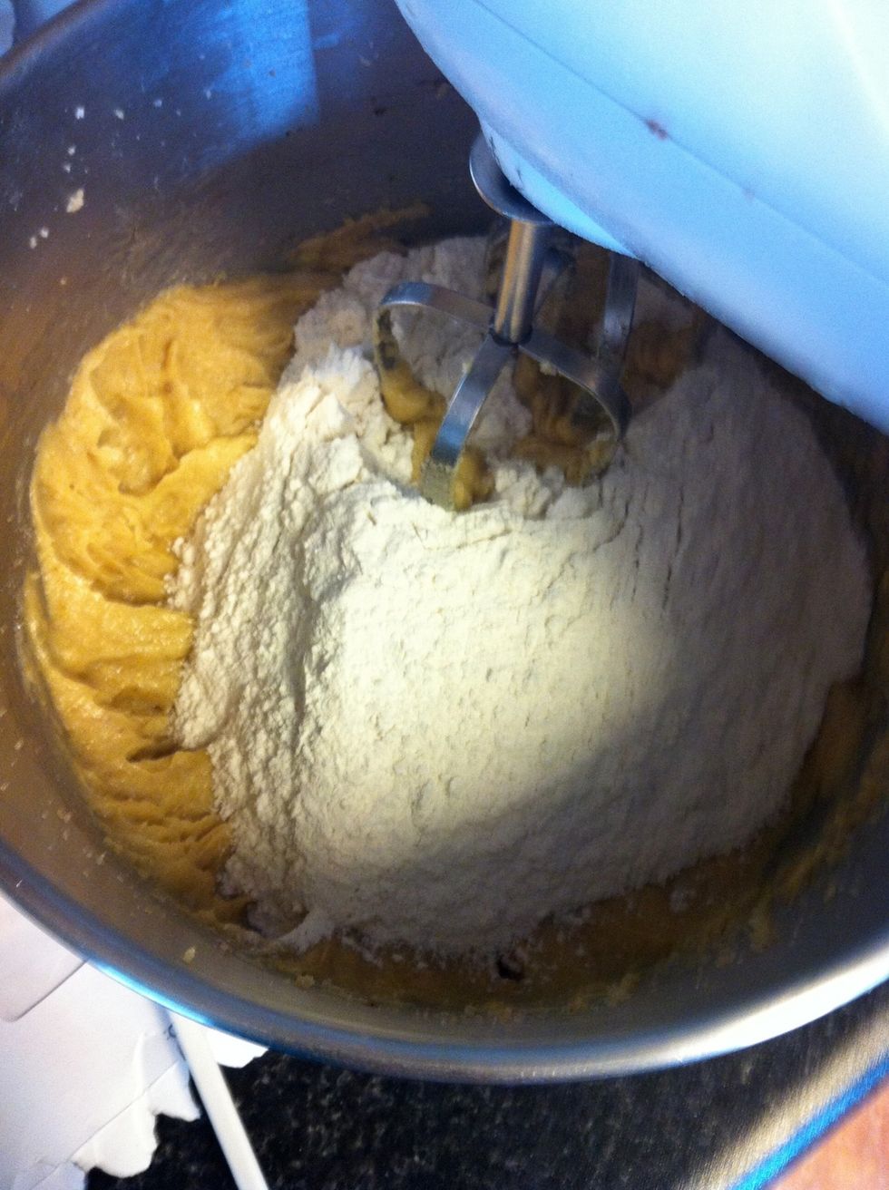 Sift the flour and baking soda then beat into the mixture