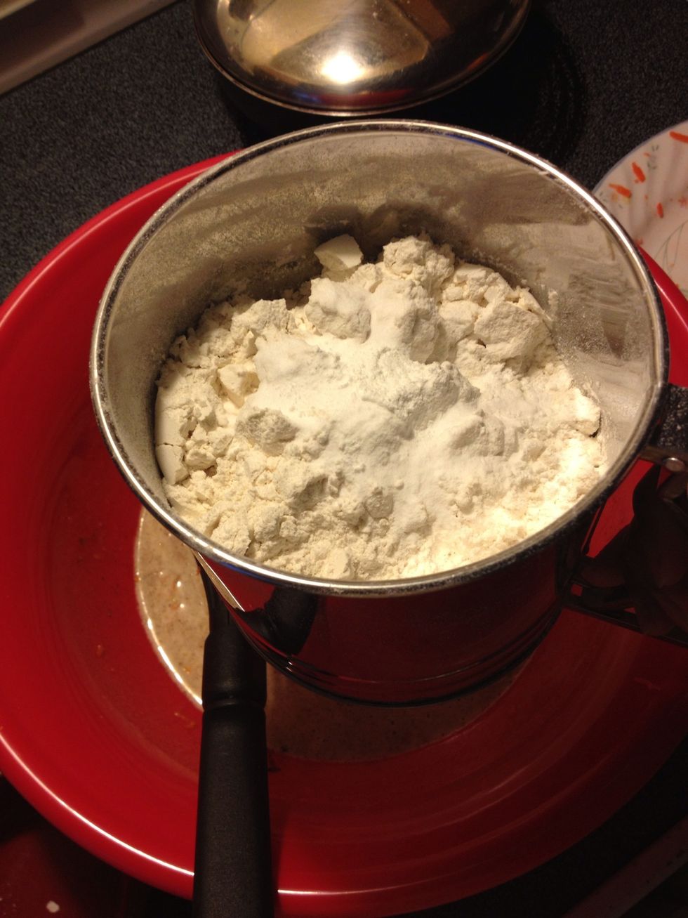Sift the flour, baking powder and baking soda. If you don't have a sieve, combine the dry ingredients in a separate bowl